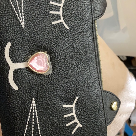 Betsey Johnson Accessories - Betsey Johnson Wallet on a string. NWT. Adorable retail price is $75.